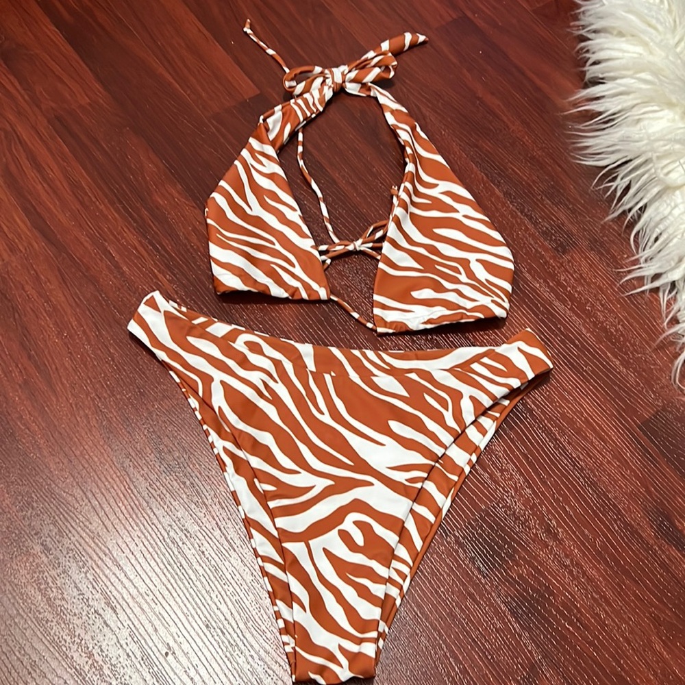 Aurelle bikini in brown animal print. Top can be worn in many different ways.